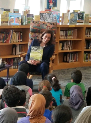 Kamala Harris, reading "Each Kindness" to school children 